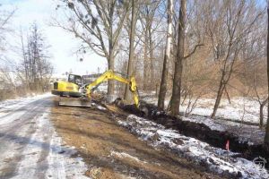 Drugi etap inwestycji - budowa ronda, odcinka drogi od skrzyżowania z drogą wojewódzką nr 708 do mostu oraz infrastruktury...